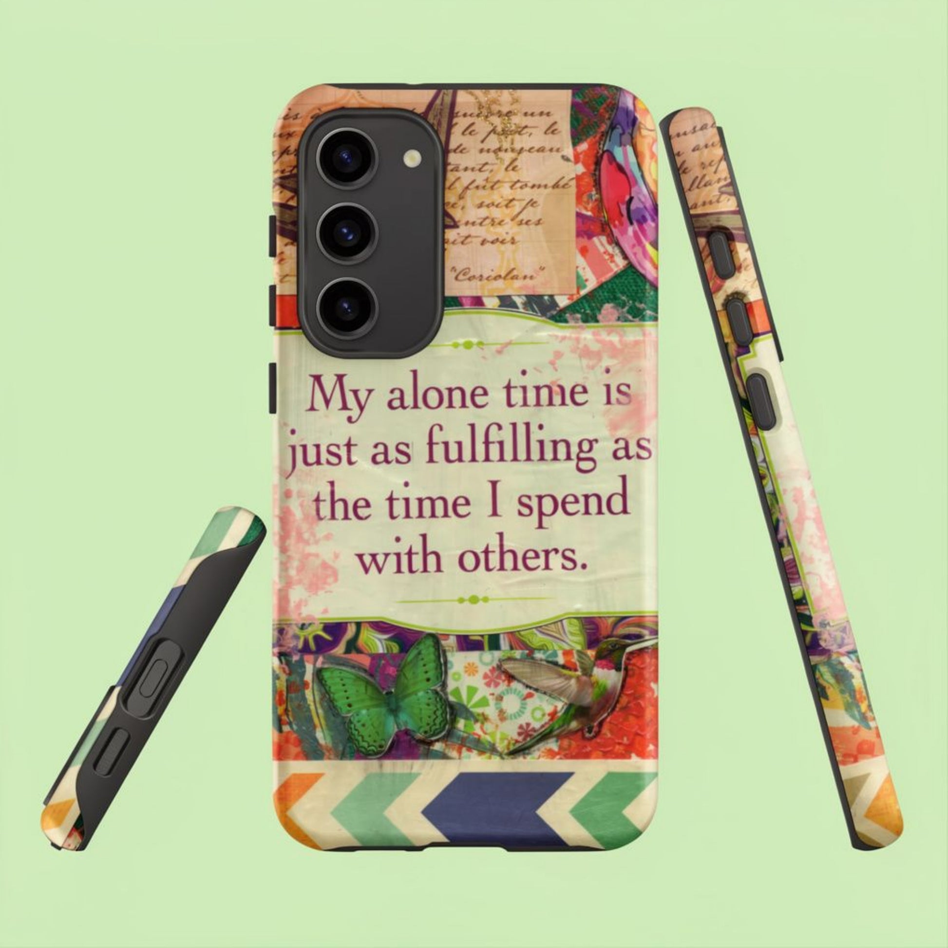 Image of the front, side and bottom view of the  colorful phone case with a motivational quote on a light green background