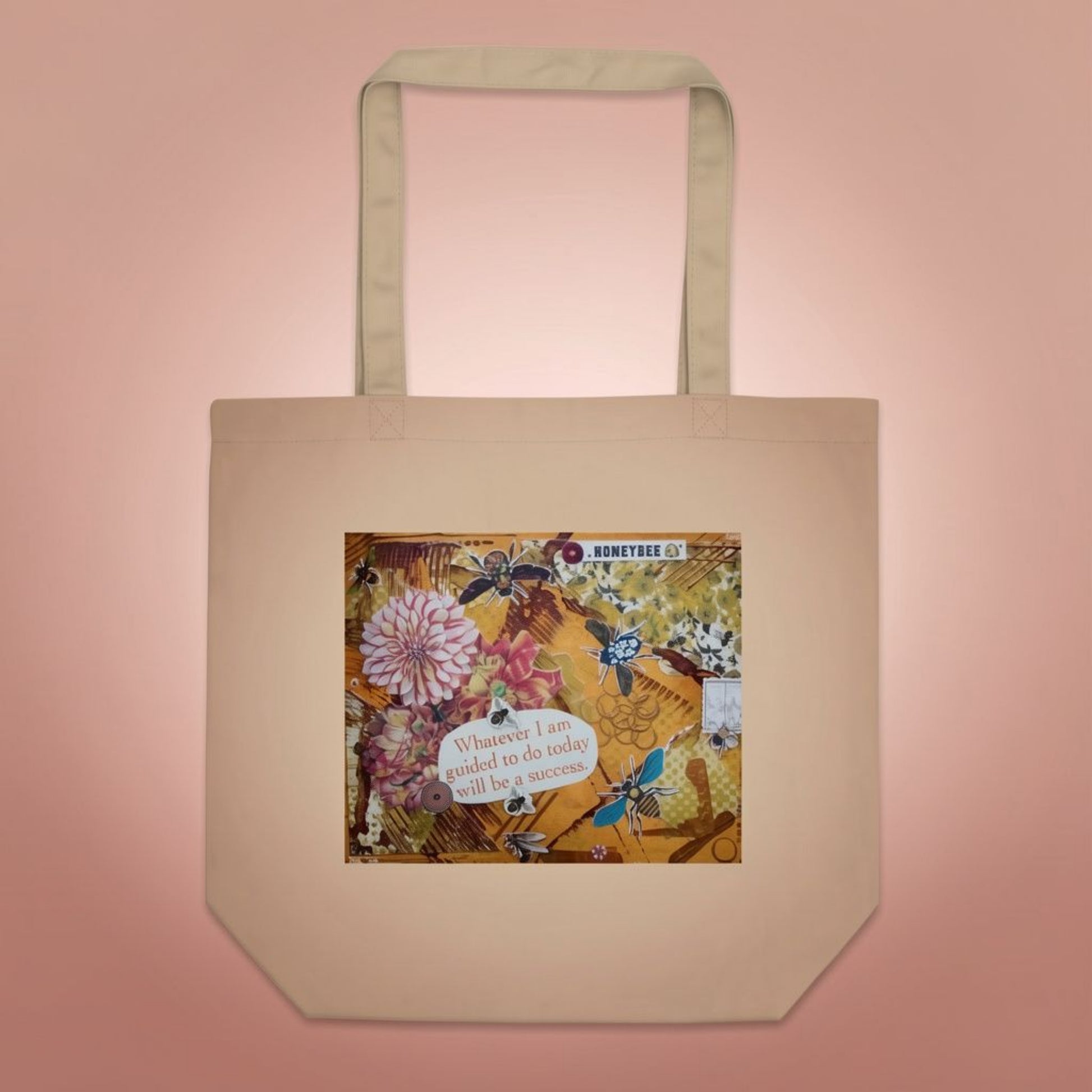 bee eco tote with honey bee art and floral design and text on a pink background