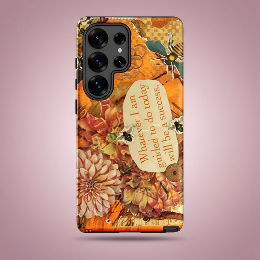 bee phone case with honey bee artwork
iPhone case with autumnal design, flowers, and motivational quote on a pink background