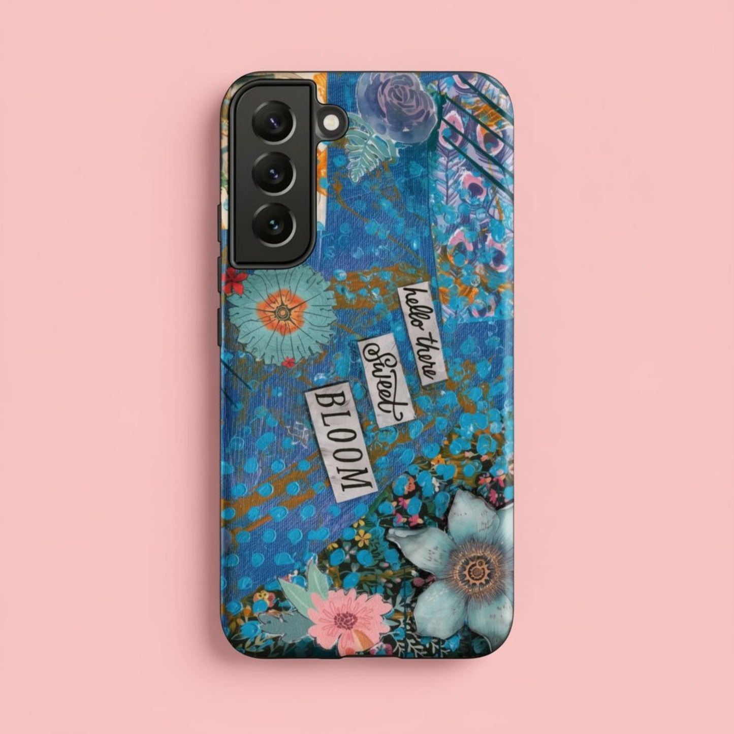 Front image of the blue and pink floral Samsung case with peacock feather layers and a quote.
