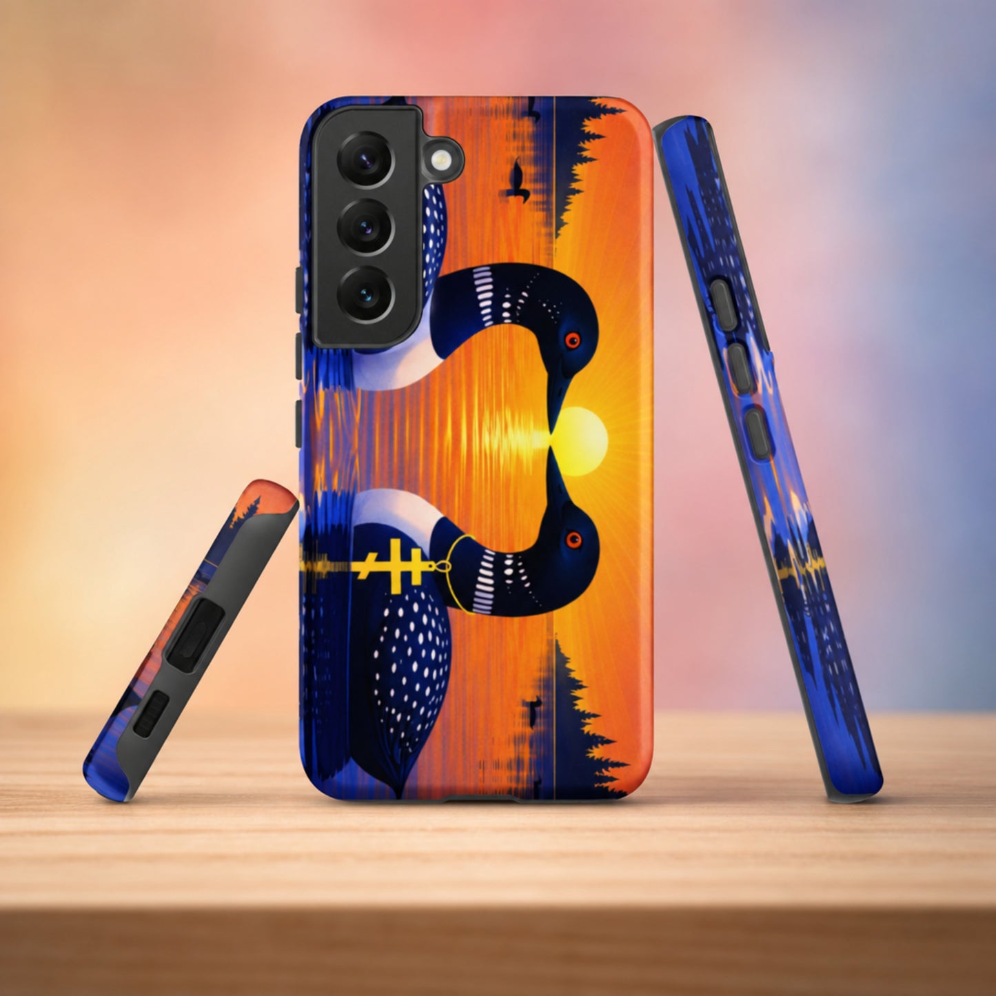 Two symbolic loons on a bird aesthetic phone case, representing the two main characters with distinctive features in a nature-inspired romantic design. Image shows front, side and bottom view of case.

