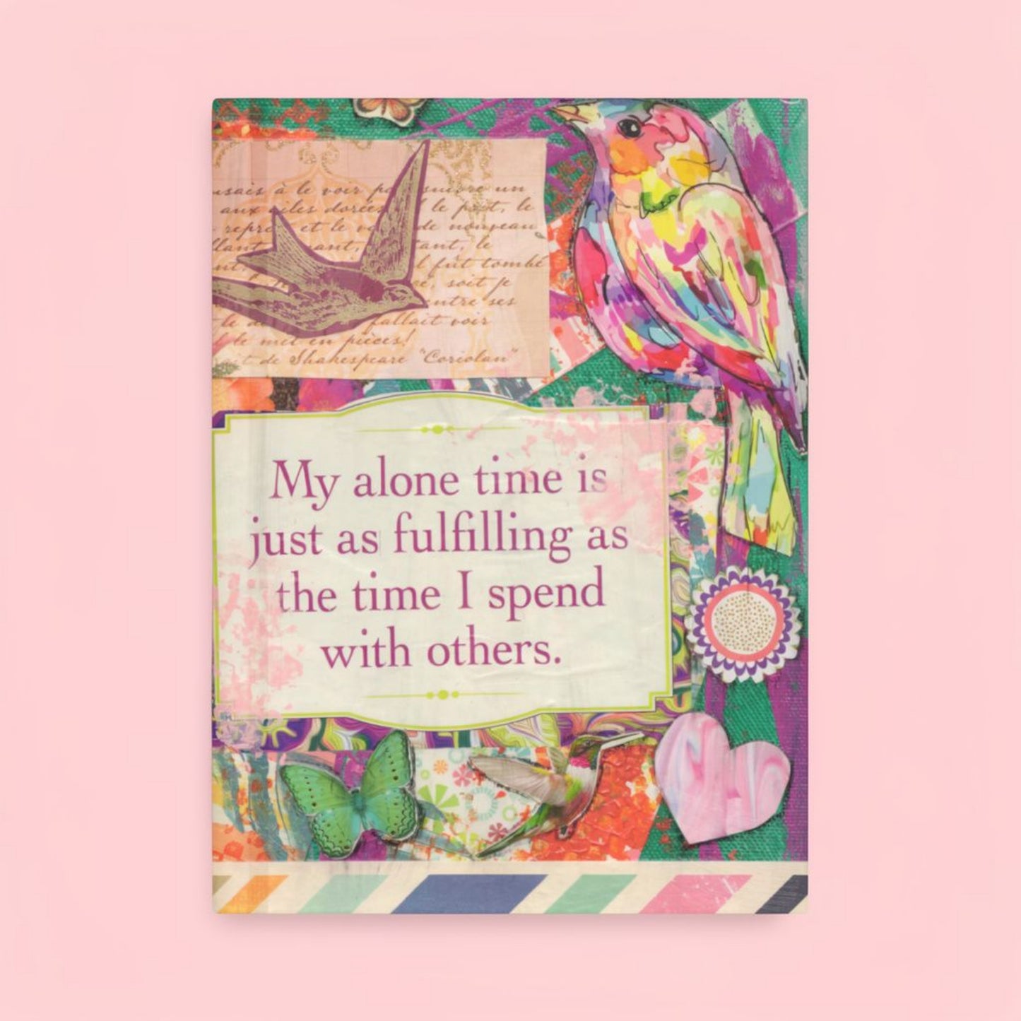 Image of the front of the Affirmation Journal- which has colorful birds, butterflies, heart and a mantra.