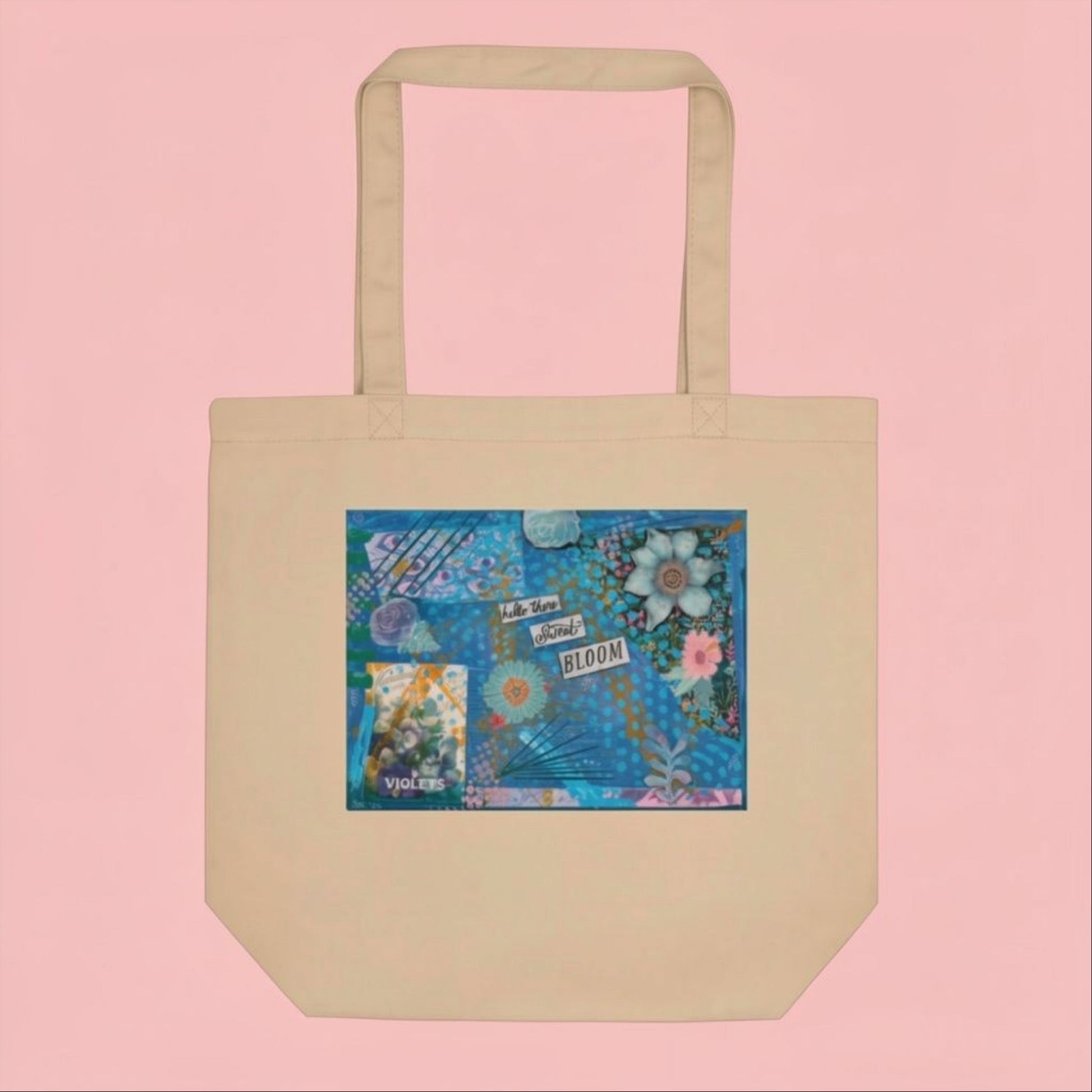 Natural Eco tote bag with a colorful floral design on the front, the design has a purple floral aesthetic and a quote says,  hello there sweet bloom