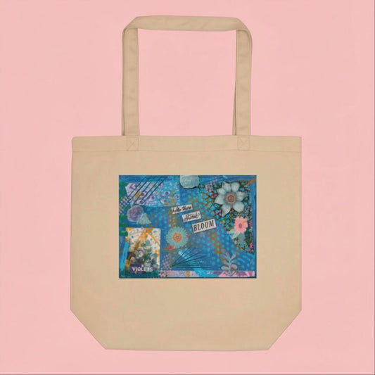 Natural Eco tote bag with a colorful floral design on the front, the design has a purple floral aesthetic and a quote says,  hello there sweet bloom