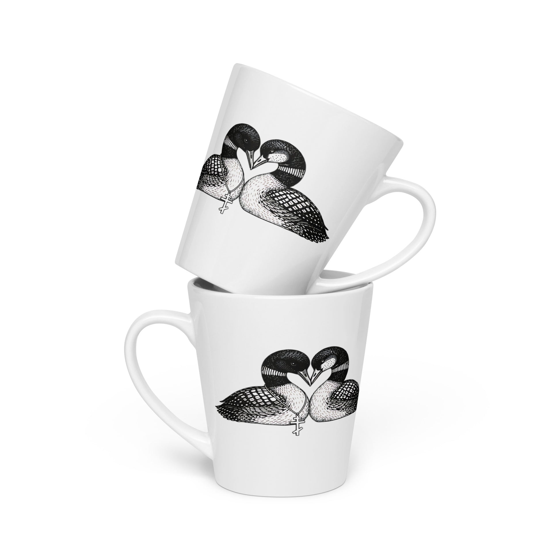 white glossy ceramic coffee mug with loon artwork on both sides.
