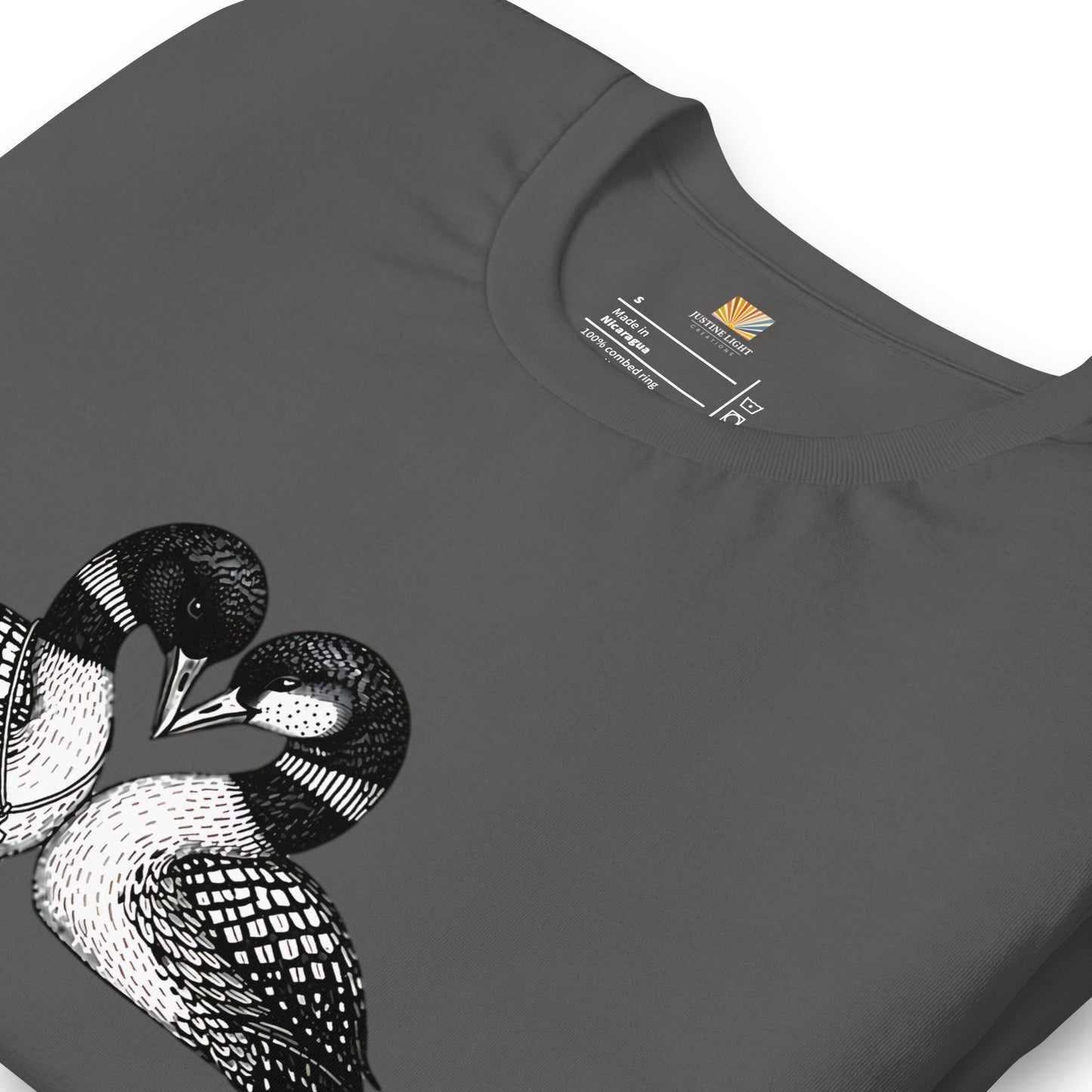 close view of crew style collar on hockey romance loon t-shirt, showing inside label. Asphalt colored shirt