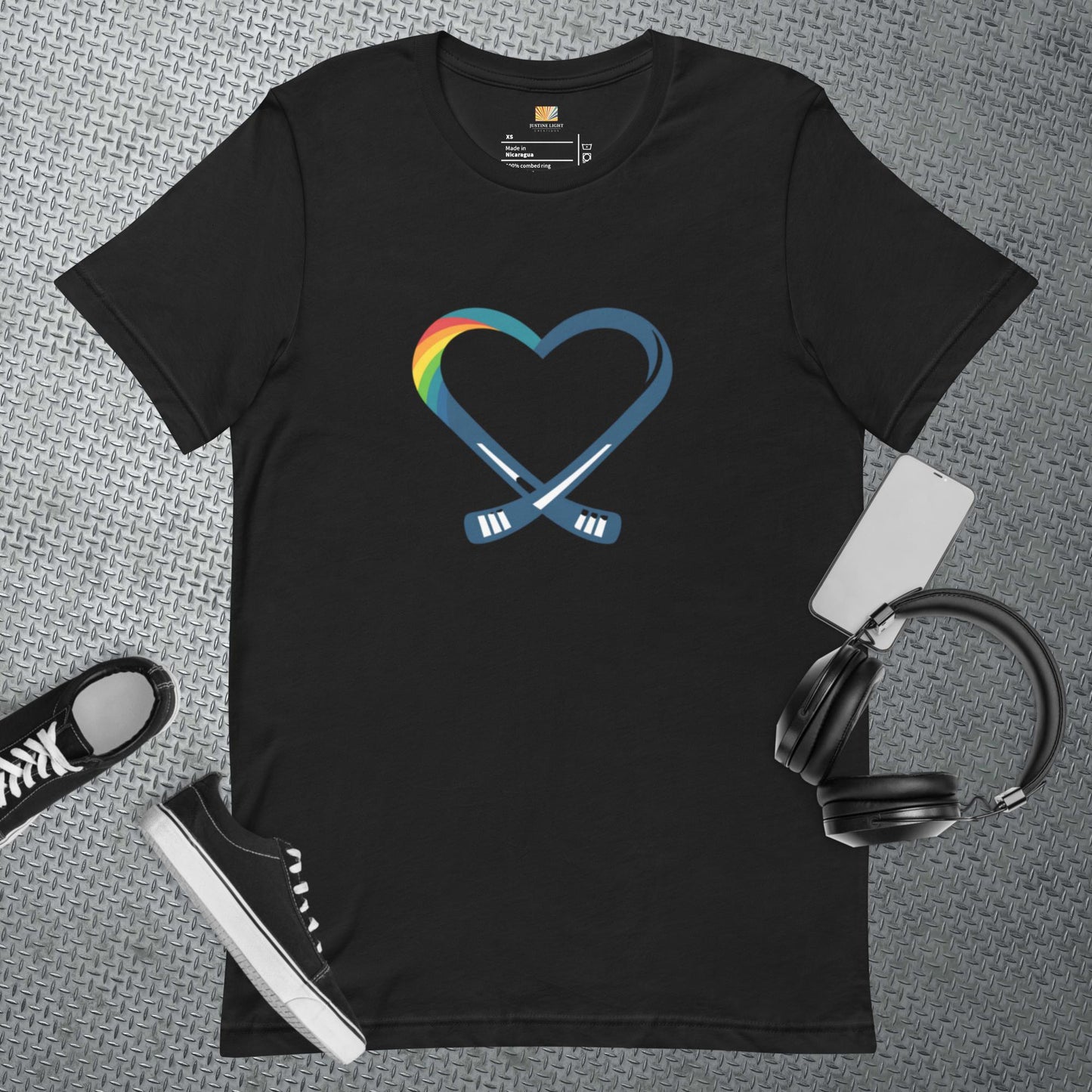 Flat view of rainbow heart t-shirt in black color with heart hockey logo with rainbow colors on it.