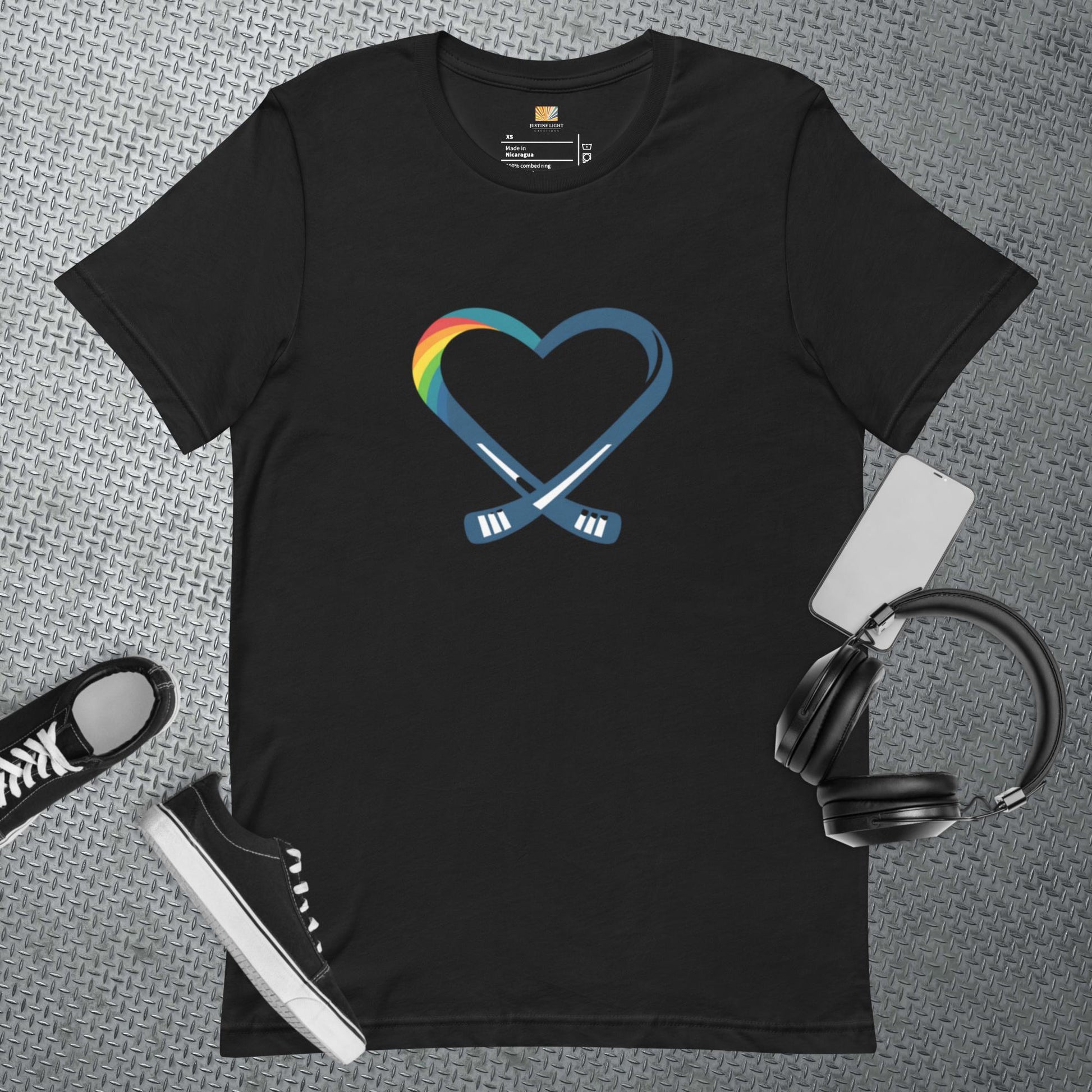 Flat view of rainbow heart t-shirt in black color with heart hockey logo with rainbow colors on it.