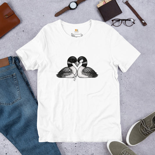 white hockey romance loon t-shirt with a black and white graphic of 2 loons with beaks together forming a heart, one loon wears a Russian orthodox cross around it's neck, the other loon has freckles on it's face.