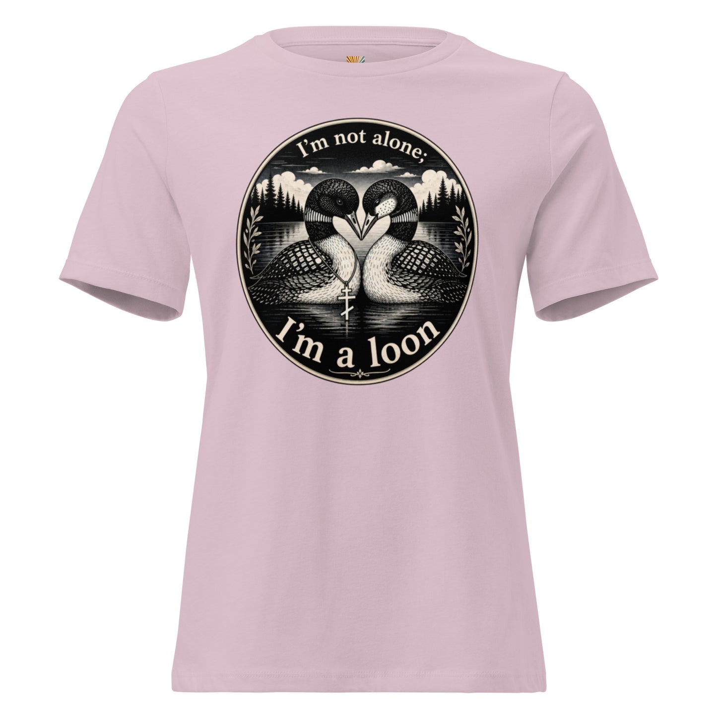 A  graphic tee for women in light violet, short-sleeved crewneck featuring a circular black and white graphic print of two loons facing each other, with the text 'I'm not alone; I'm a loon' arched above and below the illustration.